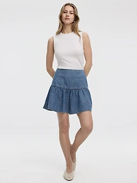 Mini-jupe en denim avec ourlet à volants