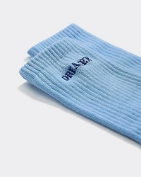 Bas côtelés avec mot à l'ourlet