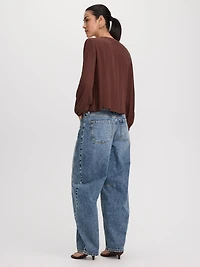 Blouse à manches longues et col fendu avec détails brodés