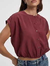 Blouse boutonnée à manches très courtes et col rond
