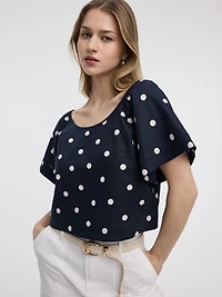 Blouse à manches volants et col dégagé