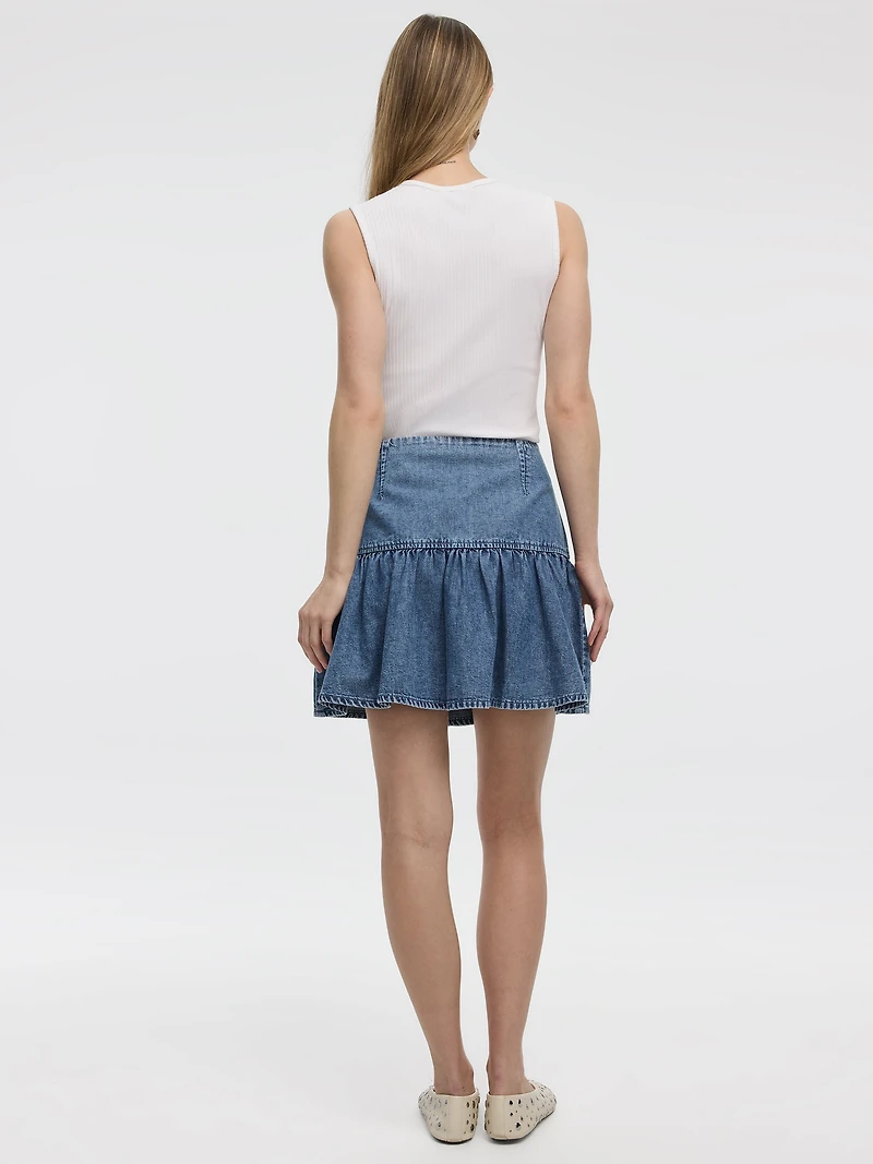 Mini-jupe en denim avec ourlet à volants