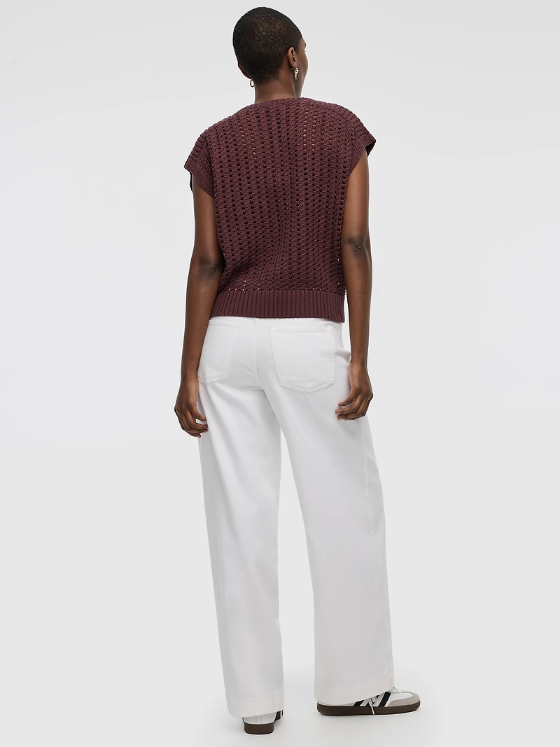 Pull à manches très courtes et col rond en mailles ajourées