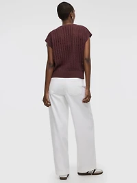 Pull à manches très courtes et col rond en mailles ajourées