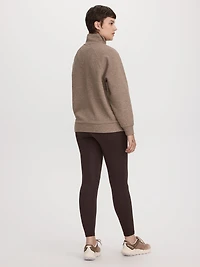 Haut texturé à manches longues et col montant demi-zip