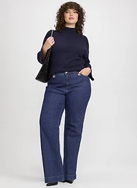 Pull en tricot à col montant et jean à jambe large