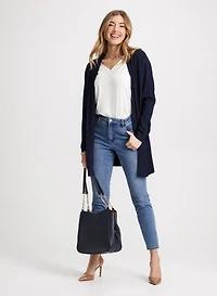 Cardigan à détails côtelés et jean à jambe étroite
