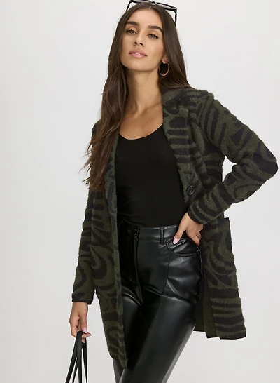 Cardigan en peluche à motif spirales