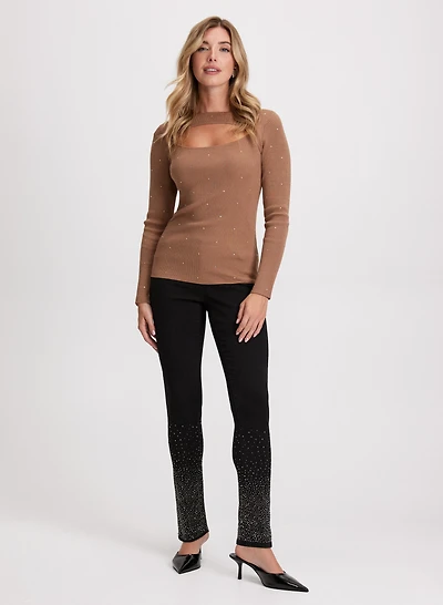 Pull à détail ajouré et jean à jambe étroite