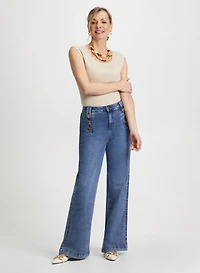 Haut ajusté à manches cape et jean large à pattes de boutonnage
