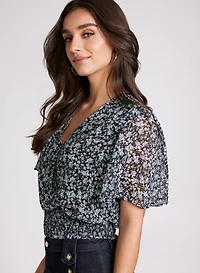 Blouse florale à manches évasées