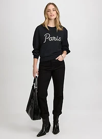 Haut à imprimé texte orné et jean à jambe droite