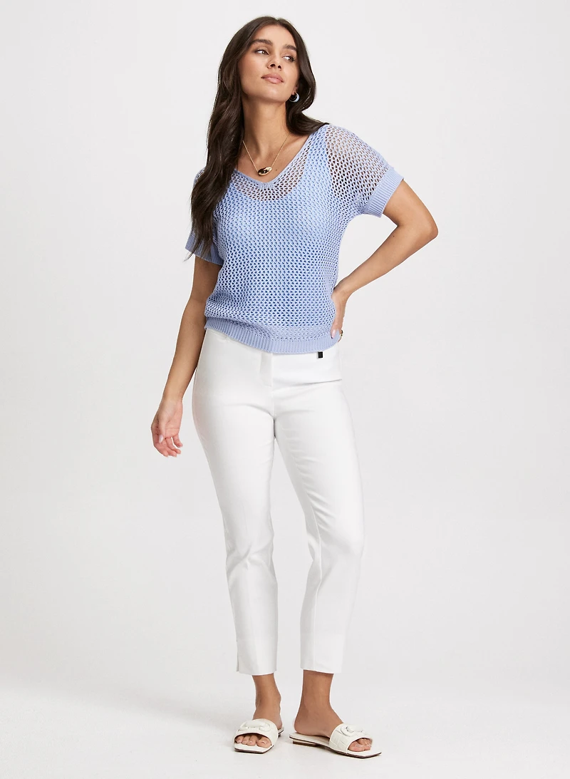 Pull en tricot ajouré et pantalon coupe Cit