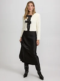 Veste en velours à paillettes et jupe en satin