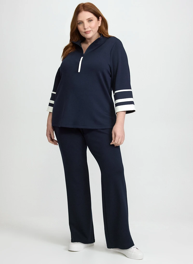 Haut à glissière et rayures et pantalon évasé à enfiler