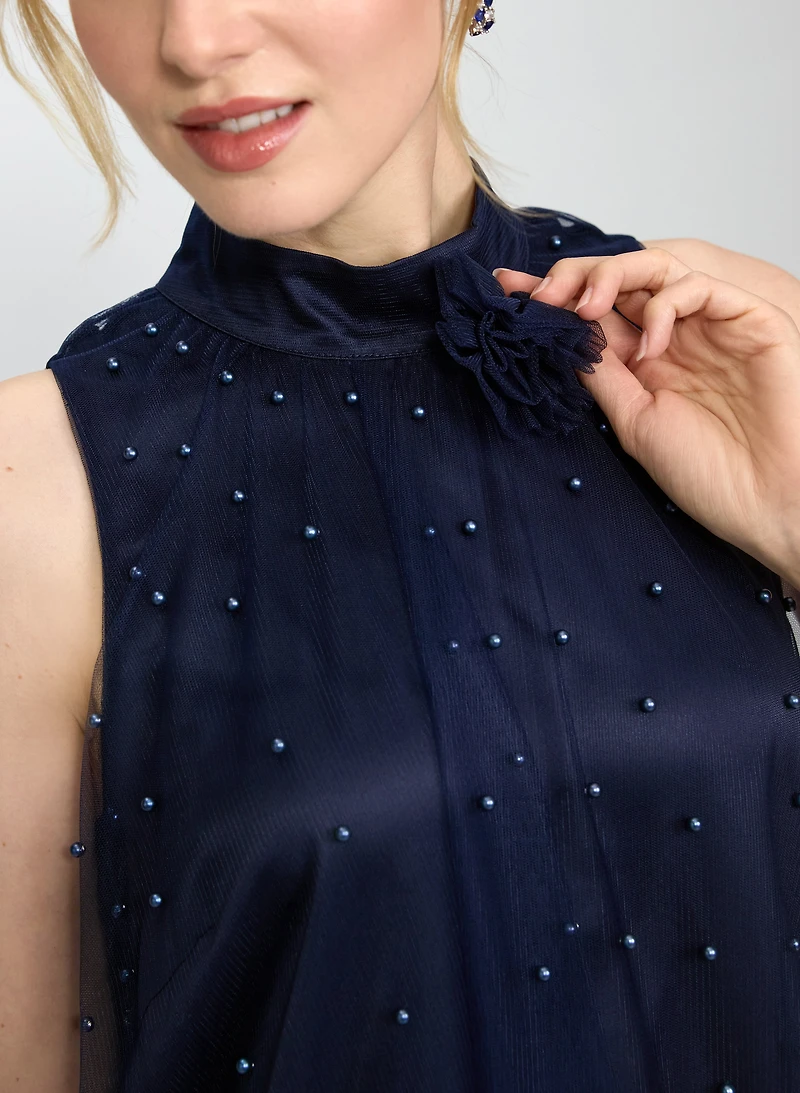 Robe cocktail transparente à perles tonales