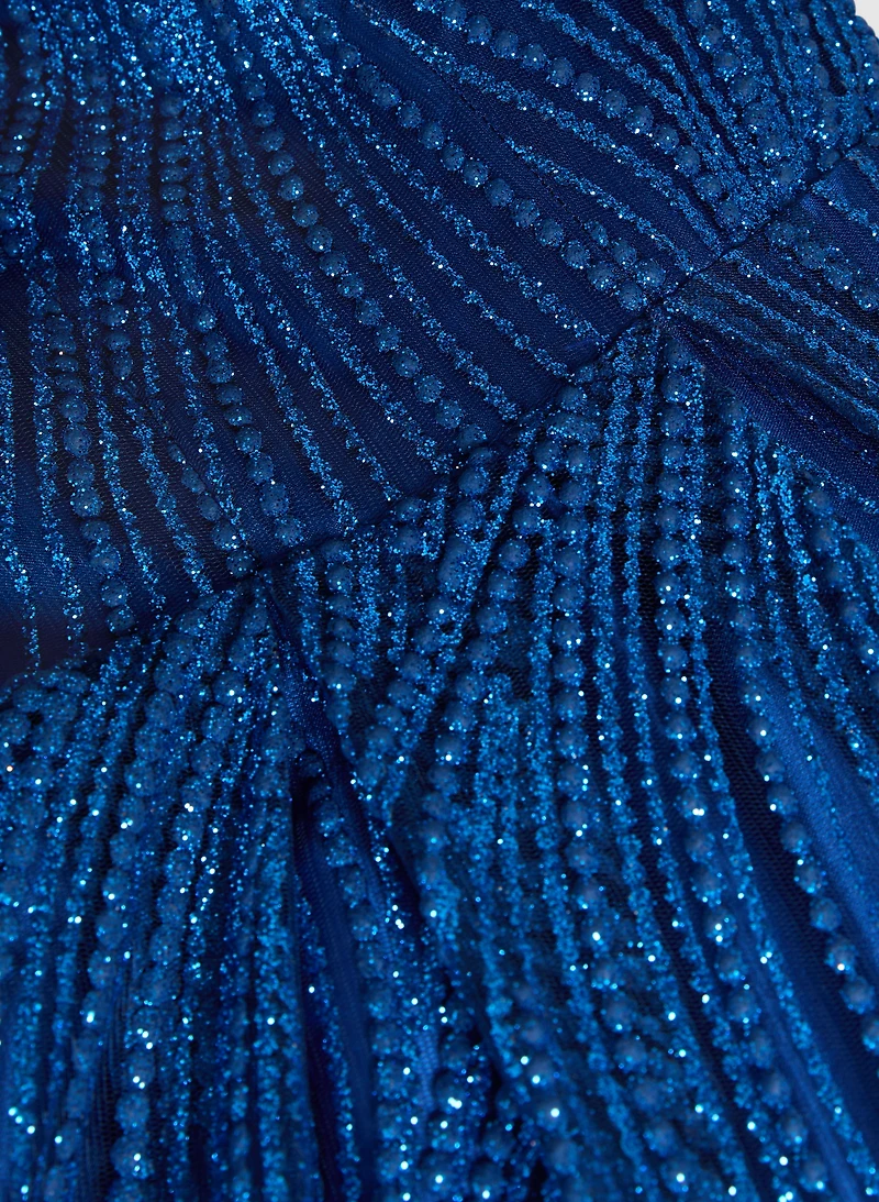 Robe scintillante à décolleté plongeant