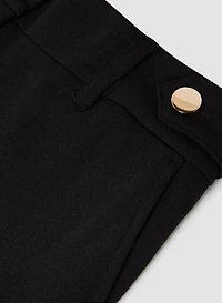 Pantalon jambe étroite à détail boutons