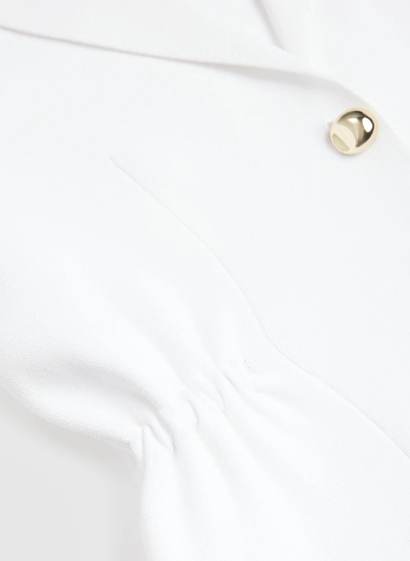 Veste en tricot à revers cranté