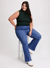 Sleeveless Mock Neck Top & Flared Leg Jeans
