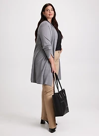 Cardigan ouvert et jean étroit