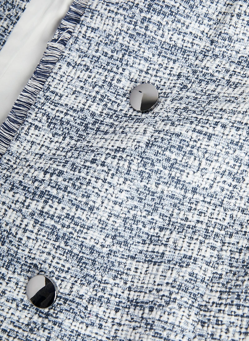 Veste redingote en tissu bouclé
