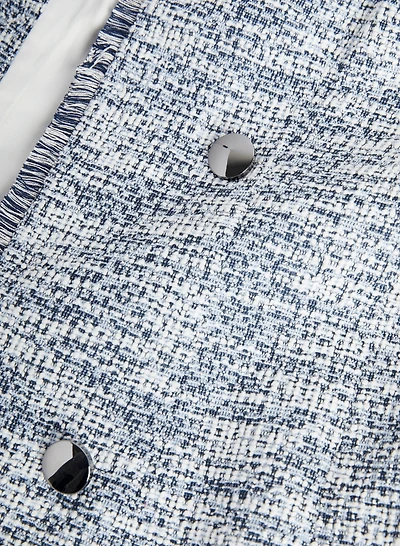 Veste redingote en tissu bouclé