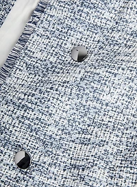 Veste redingote en tissu bouclé