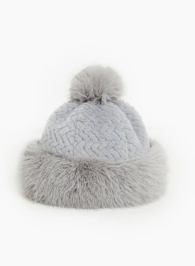 Tuque en fourrure à pompon amovible