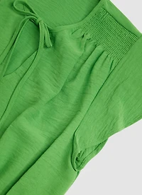 Robe à volants et taille smockée