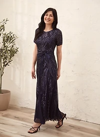 Robe longue en maille filet et paillettes