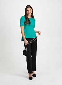 Haut péplum et pantalon large
