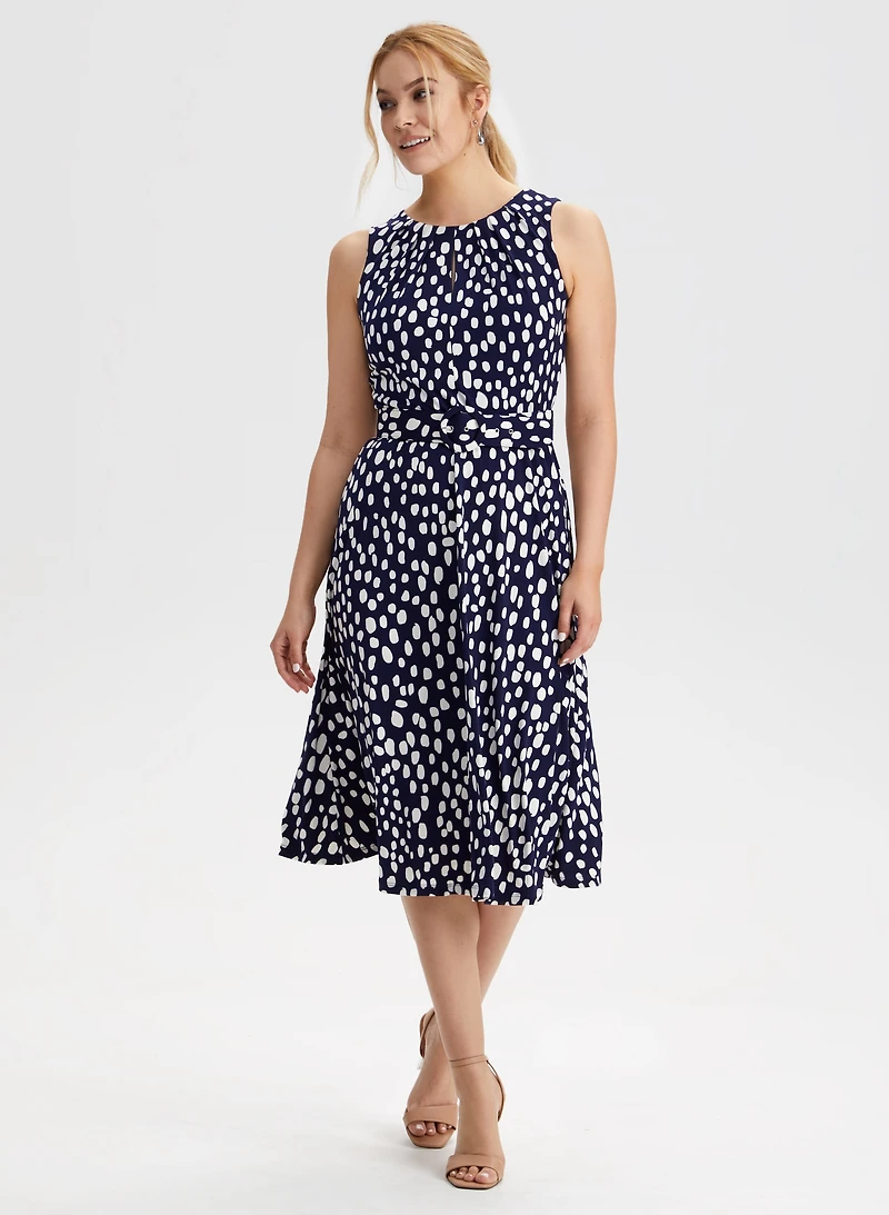 Robe midi à motif pois et ceinture