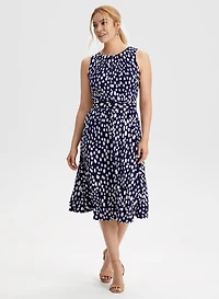 Robe midi à motif pois et ceinture