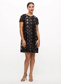 Robe en sequins et boucles à crêtes