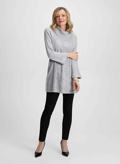 Pull tunique et jean étroit noir