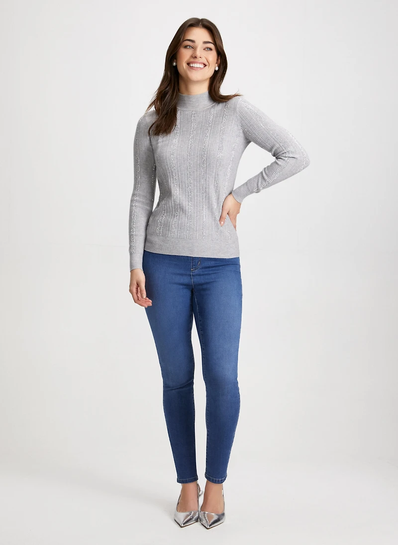 Pull à col montant et jean étroit
