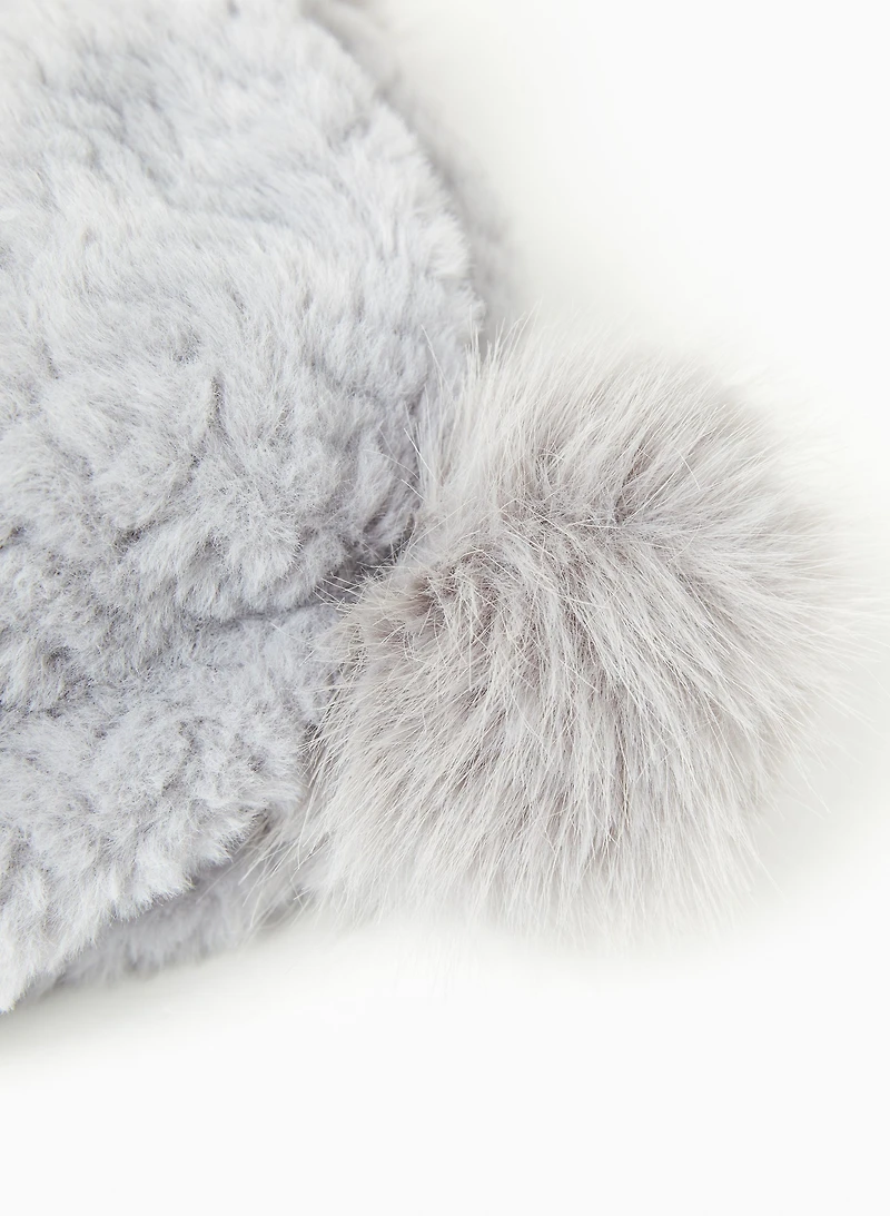 Tuque en fourrure à pompon amovible