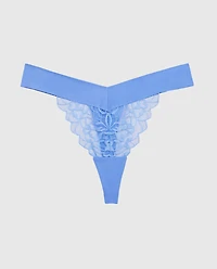 Tanga à jambe échancrée en dentelle