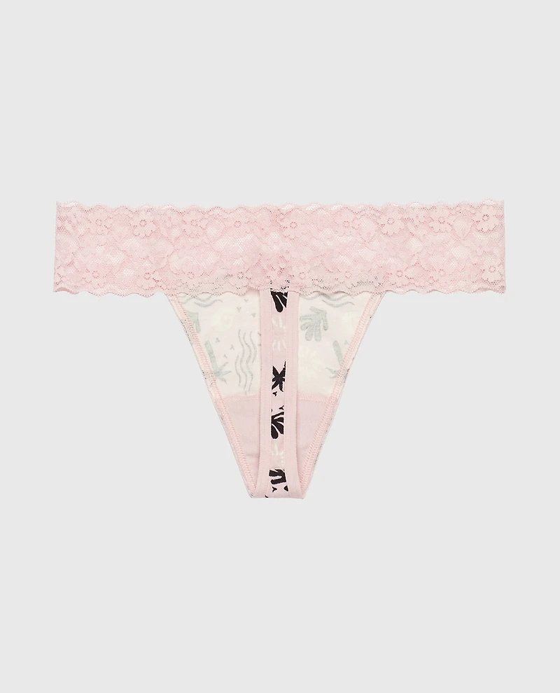 Tanga avec bordure en dentelle rose des îles