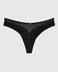 Tanga jambe échancrée en filet noir
