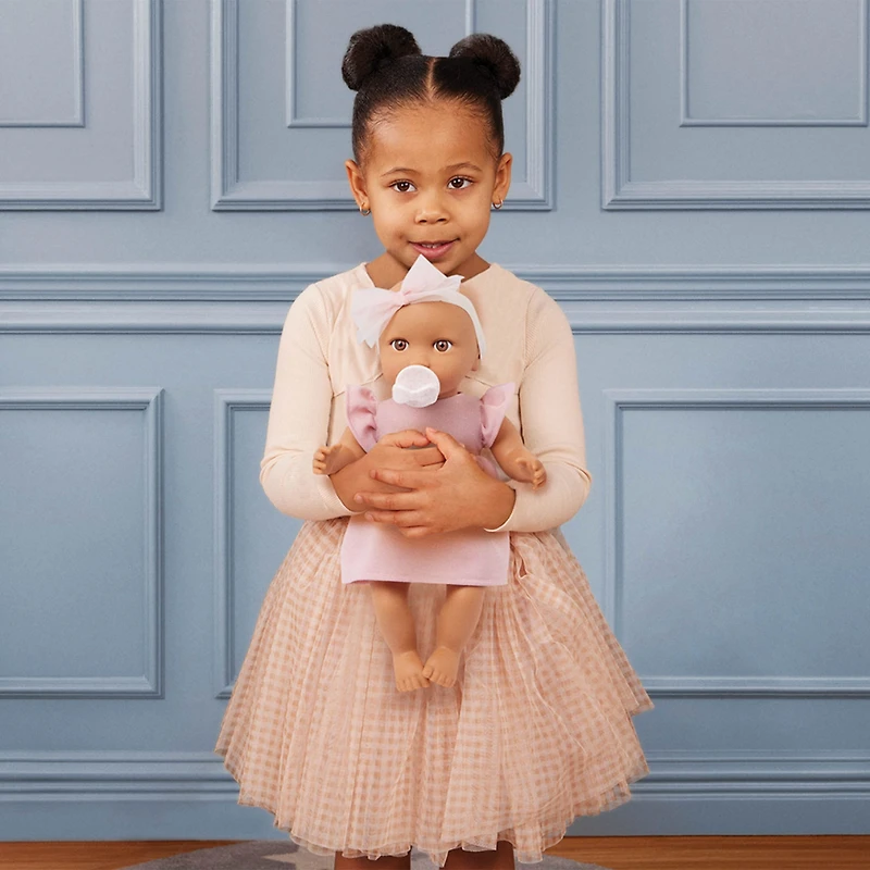 Poupée avec Robe Rose