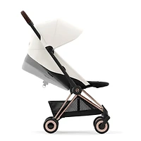 Poussette Coya - Cadre or rose avec siège blanc cassé