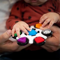 Jouet sensoriel Curiosity Clutch Baby Einstein