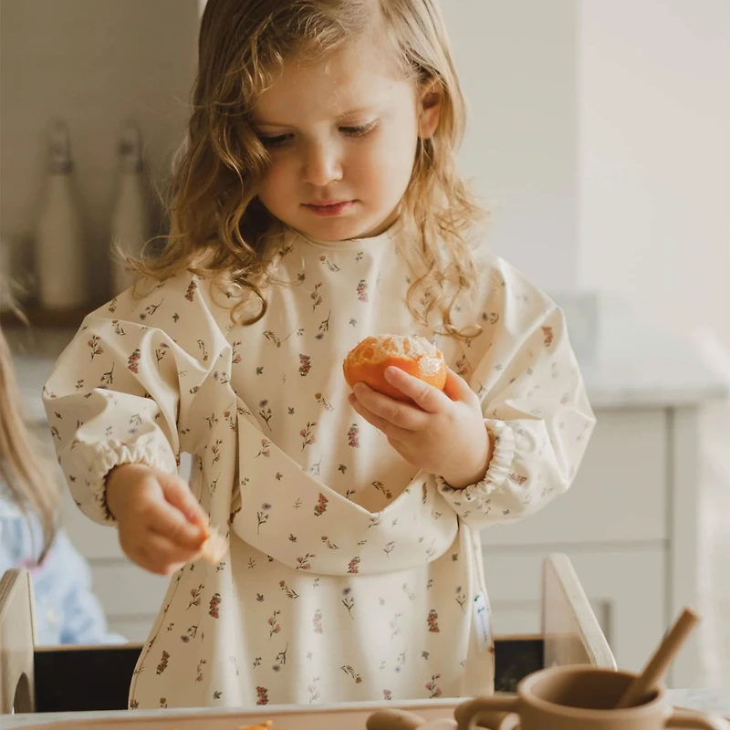 Bavoir Manches Longues Pochette intégrée 2-4ans - Les Fleurs