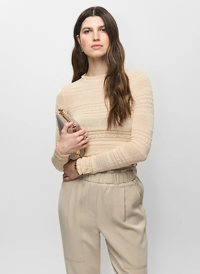 Pull en tricot pointelle à volants