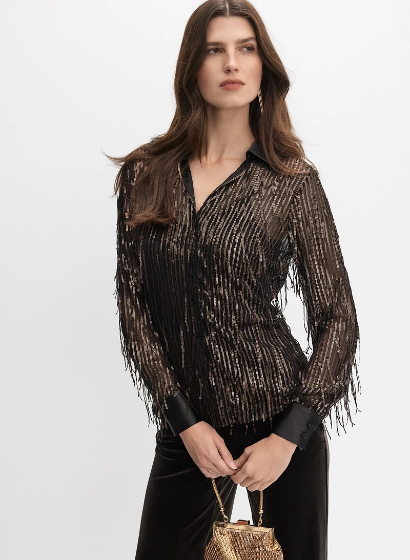 Blouse à paillettes et franges