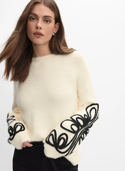 Pull en soutache à broderie