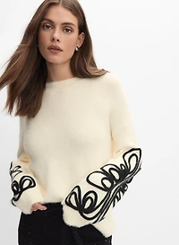 Pull en soutache à broderie