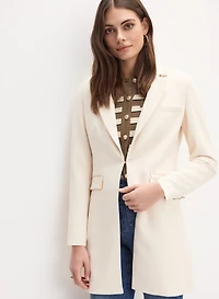 Veste longue à détails métalliques